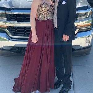 gold bust, red prom dress